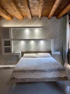 A bed or beds in a room at City Live