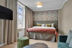 Postel nebo postele na pokoji v ubytování Home Hotel Gabelshus