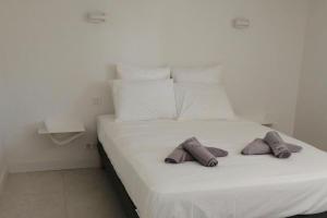 Postel nebo postele na pokoji v ubytování Villa de standing dans le Golfe de Saint-Tropez