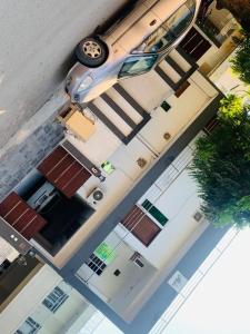 an overhead view of a car parked on a garage at Star light in Islamabad