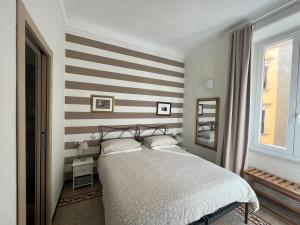 Postel nebo postele na pokoji v ubytování Affittacamere Perla del Prione + 12 fotografií