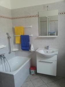 Kúpeľňa v ubytovaní Conte Caramelli Apartment