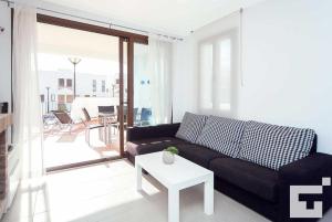 A seating area at Villa Mirador de Bassetes 4 - Grupo Turis
