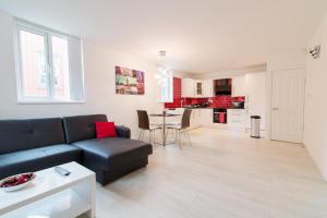 Гостиная зона в Nazarene apartments in Leeds