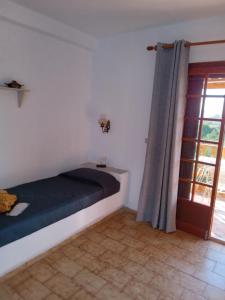 Postel nebo postele na pokoji v ubytování Romanza Villas