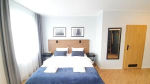 Postel nebo postele na pokoji v ubytování Sleep Port B&B - bezpłatny parking