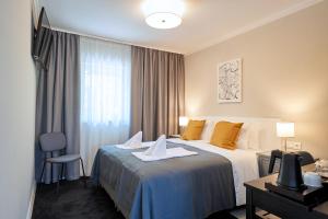 Postel nebo postele na pokoji v ubytování La Maison + 29 fotografií
