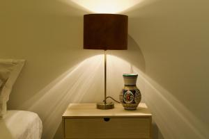 Ένα ή περισσότερα κρεβάτια σε δωμάτιο στο B&B de Fruithof