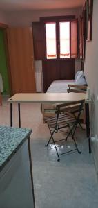 A bed or beds in a room at Coqueto Estudio 1