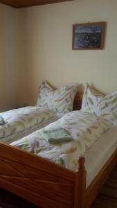 En eller flere senge i et værelse på Stoagrawihof
