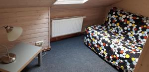Llit o llits en una habitació de Ferienhaus Sandboll am Meer