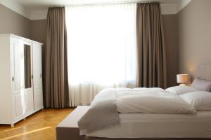 Postel nebo postele na pokoji v ubytování Ferienwohnung am Brühl