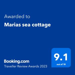 フンシャルにあるMarias sea cottageのマリアス海のコーヒーの文字が付いた青いスクリーン