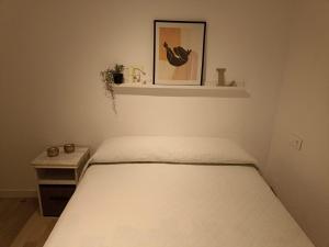 Postel nebo postele na pokoji v ubytování Vista Bahia Benidorm