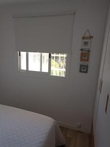 Postel nebo postele na pokoji v ubytování Vista Bahia Benidorm