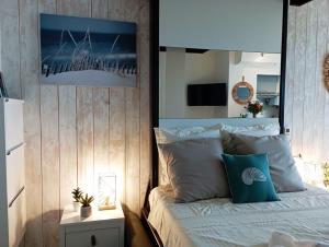 Posteľ alebo postele v izbe v ubytovaní Rêve de plage - Confortable appt pour 2