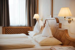 Postel nebo postele na pokoji v ubytování Gourmet Hotel Gran Ander