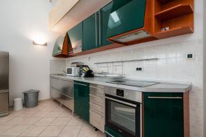 Kuchyňa alebo kuchynka v ubytovaní Apartment Branka - Monterol