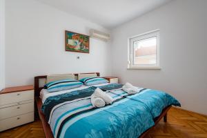 Posteľ alebo postele v izbe v ubytovaní Apartment Branka - Monterol