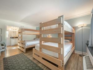 a bunk bed room with two bunk beds at The Waterway Pet Friendly by Carolina Retreats in Wrightsville Beach