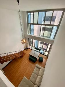 an overhead view of a living room with a couch and a table at Aqua Loft in Quito