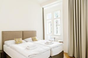 Postel nebo postele na pokoji v ubytování Apartment Brno + 94 fotografií