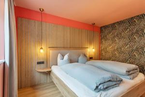 A bed or beds in a room at Luisalle Top 6