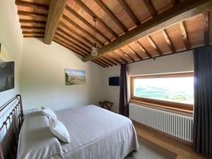 A bed or beds in a room at Renzo Marinai