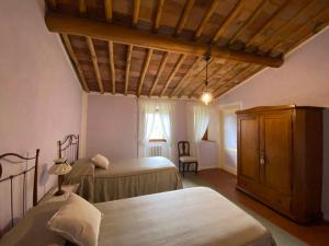 A bed or beds in a room at Renzo Marinai