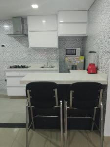 A cozinha ou kitchenette de Elite Home Apartamentos