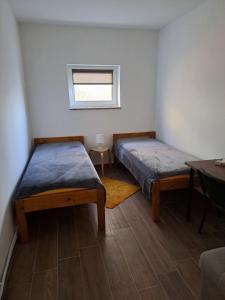Postel nebo postele na pokoji v ubytování sara1