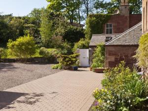 a brick driveway in front of a house at Inchgarry Court in North Berwick