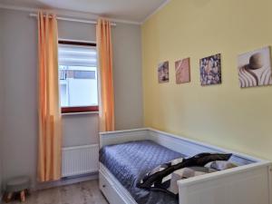 Łóżko lub łóżka w pokoju w obiekcie visit baltic - na Platanie