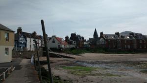 a group of houses and buildings in a town at Harbourside Cottage in North Berwick
