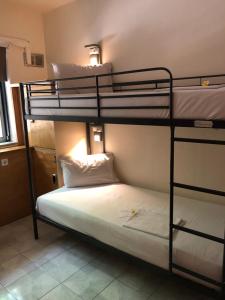 Posteľ alebo postele v izbe v ubytovaní Rhodes Backpackers Boutique Hostel and Apartments