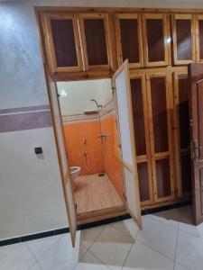 an open door to a shower in a bathroom at شقق مفروشة الفري in Laayoune