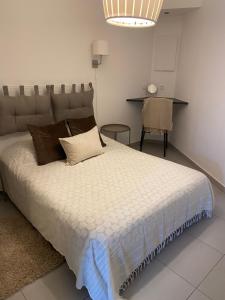 En eller flere senge i et værelse på Au cœur de St Jean Cap Ferrat