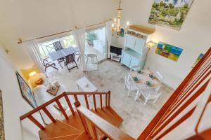 an overhead view of a living room and dining room at Waterfront apartment Palma in Kralendijk