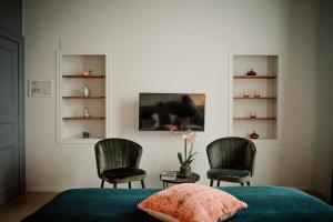 TV a/nebo společenská místnost v ubytování Relais M B&B