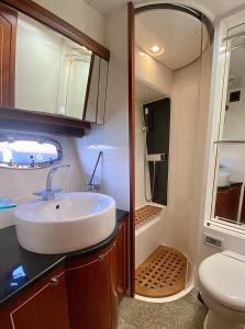 a bathroom with a sink and a toilet at Yacht in Barcelona in Barcelona