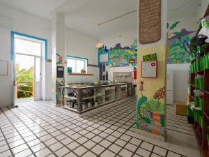 a room with a kitchen with a counter in it at Jungle House in Las Palmas de Gran Canaria