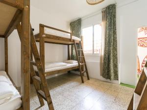 Posteľ alebo postele v izbe v ubytovaní Jungle House