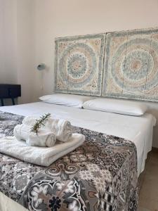 A bed or beds in a room at Trulli in Vigna