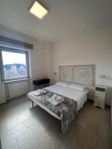 A bed or beds in a room at Trulli in Vigna