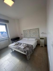 A bed or beds in a room at Trulli in Vigna