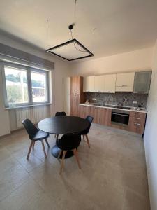 A kitchen or kitchenette at Trulli in Vigna