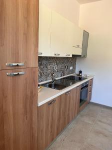 A kitchen or kitchenette at Trulli in Vigna