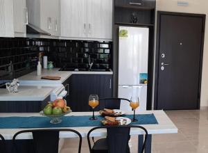 Dapur atau dapur kecil di AYRA ROOMS ALIVERI +12 gambar