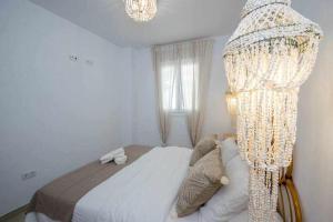 Łóżko lub łóżka w pokoju w obiekcie Casa Marinero beach 1