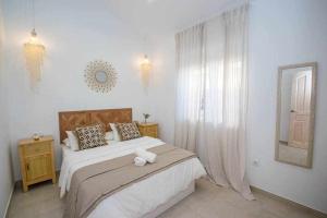 Posteľ alebo postele v izbe v ubytovaní Casa Marinero beach 3